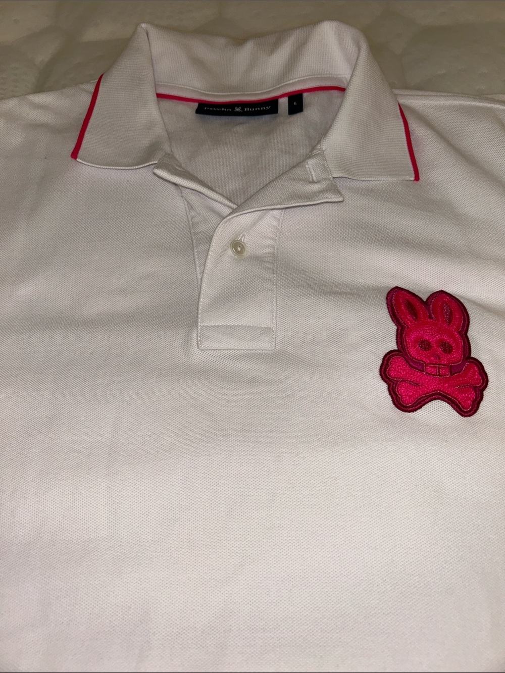 Psycho Bunny Men White Polo with Pink Trim and Pink Bunny Patch